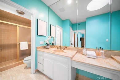 Perched on the top floor with soaring vaulted ceilings and