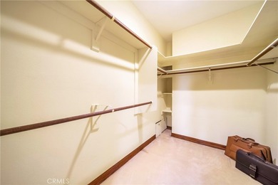 Perched on the top floor with soaring vaulted ceilings and