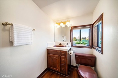 Perched on the top floor with soaring vaulted ceilings and