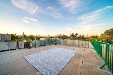 Perched on the top floor with soaring vaulted ceilings and