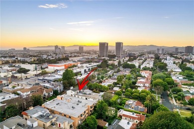 Perched on the top floor with soaring vaulted ceilings and