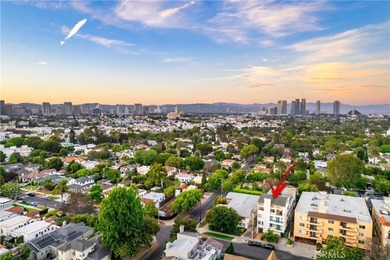 Perched on the top floor with soaring vaulted ceilings and