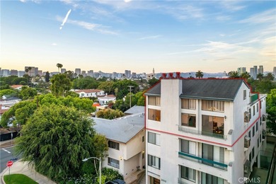 Perched on the top floor with soaring vaulted ceilings and