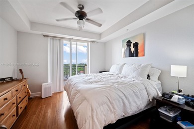 Bathed in natural light, this spacious 7th-floor split 2BR/2BA