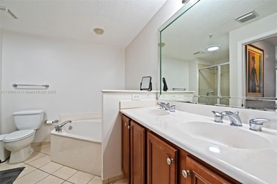 Bathed in natural light, this spacious 7th-floor split 2BR/2BA