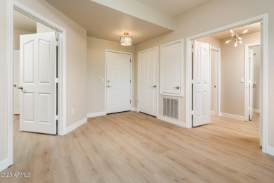 Recently updated: new floors and freshly painted. Resort-style