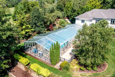 This one-of-a-kind, customized home is located in the sought