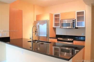 Gorgeous and spacious 2 bed 2 bath condo. High end building at