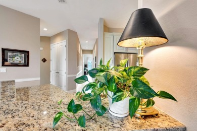 Welcome to a rare opportunity to live in Palma Sola Bay Club, a