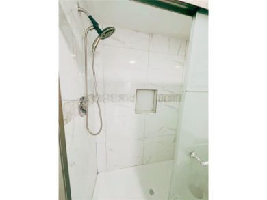 Move-in ready first-floor condo on the lake. This 2-bedroom