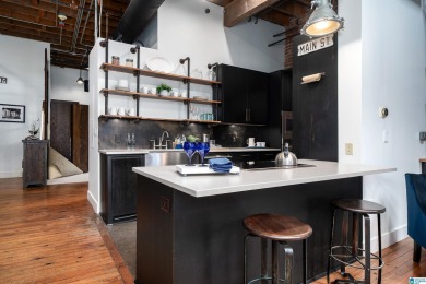 One-of-a-kind 2 bed, 2 bath loft in the historic Rhodes Carroll