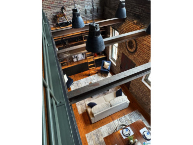 One-of-a-kind 2 bed, 2 bath loft in the historic Rhodes Carroll