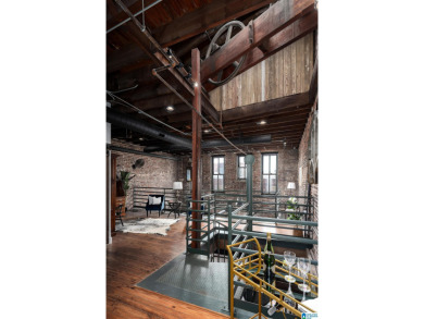 One-of-a-kind 2 bed, 2 bath loft in the historic Rhodes Carroll