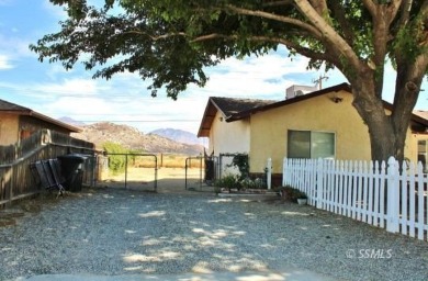 This home comes with a White Picket Fence! Great opportunity for