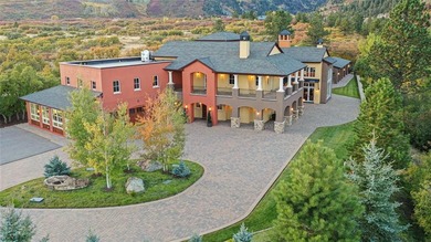 OPULENCE IN THE MOUNTAINS! This breathtaking 175-acre estate