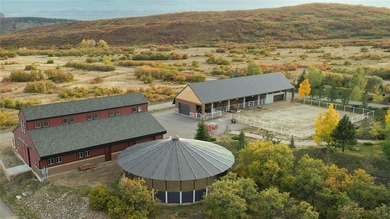 OPULENCE IN THE MOUNTAINS! This breathtaking 175-acre estate