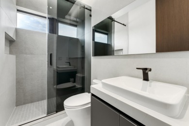 A modern sanctuary on the water, this newly built Key Largo