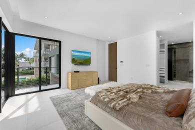 A modern sanctuary on the water, this newly built Key Largo