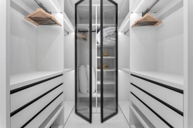 A modern sanctuary on the water, this newly built Key Largo