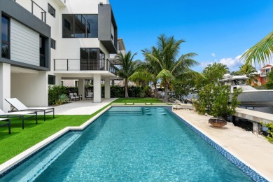 A modern sanctuary on the water, this newly built Key Largo