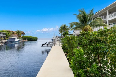 A modern sanctuary on the water, this newly built Key Largo