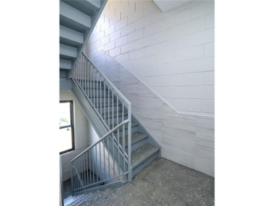 Welcome to this stunning duplex 3-bedroom, 3-bath penthouse with