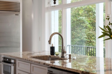 Enjoy light filled marsh front + Ashley River views & downtown