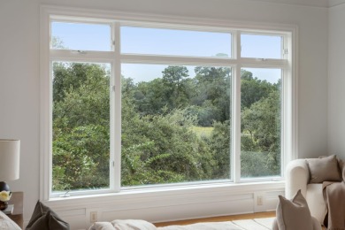 Enjoy light filled marsh front + Ashley River views & downtown