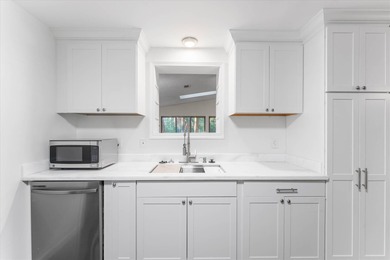 Solid brick 4-bed/2-bath with a flexible nine-room layout-living