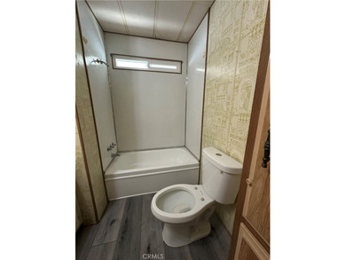 Welcome to A Move-In Ready, Newly Renovated Gem in a Gated 55+