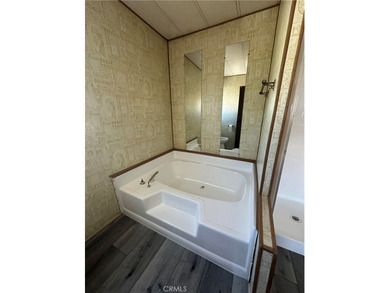 Welcome to A Move-In Ready, Newly Renovated Gem in a Gated 55+