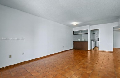 Spacious and freshly painted 1-bedroom, 1-bath condo featuring a