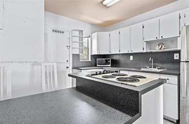 Spacious and freshly painted 1-bedroom, 1-bath condo featuring a