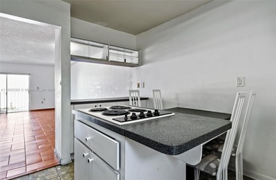 Spacious and freshly painted 1-bedroom, 1-bath condo featuring a