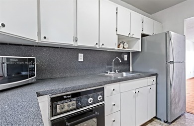 Spacious and freshly painted 1-bedroom, 1-bath condo featuring a