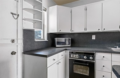 Spacious and freshly painted 1-bedroom, 1-bath condo featuring a