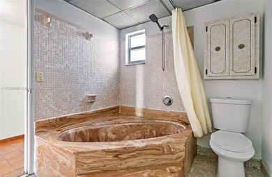 Spacious and freshly painted 1-bedroom, 1-bath condo featuring a