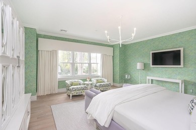 This 2,361 sq. ft. Eastbourne Lodge condo offers a refined blend