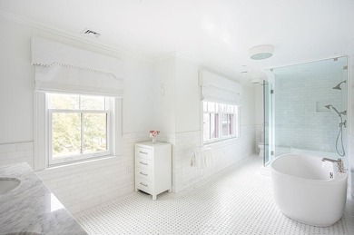 This 2,361 sq. ft. Eastbourne Lodge condo offers a refined blend