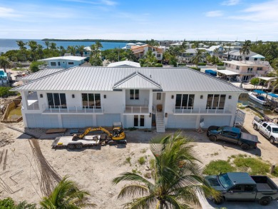 Brand New Luxury Oceanfront Estate!!!Experience the pinnacle of