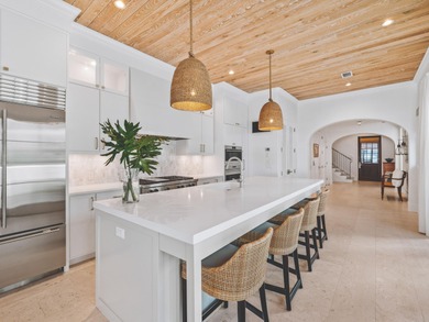 This stunning Camp Creek Lake residence offers private