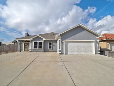 Your Island Oasis awaits you with this exceptional property that