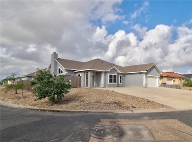 Your Island Oasis awaits you with this exceptional property that