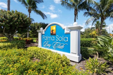 Welcome to Palma Sola Bay Club, a luxury gated condominium