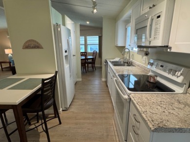 Welcome to this beautifully maintained 1980 home, offering 1,248