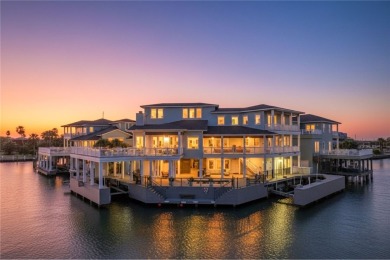 Experience coastal living at its finest in this stunning canal