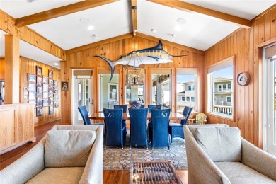 Experience coastal living at its finest in this stunning canal