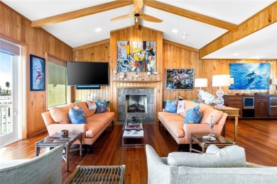 Experience coastal living at its finest in this stunning canal