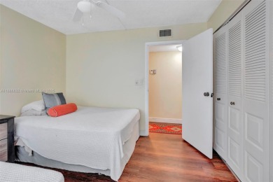 BEAUTIFUL 2/2 CONDO - ENCLOSED AND SCREENED BALCONY WITH VIEW ON