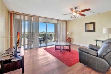 BEAUTIFUL 2/2 CONDO - ENCLOSED AND SCREENED BALCONY WITH VIEW ON